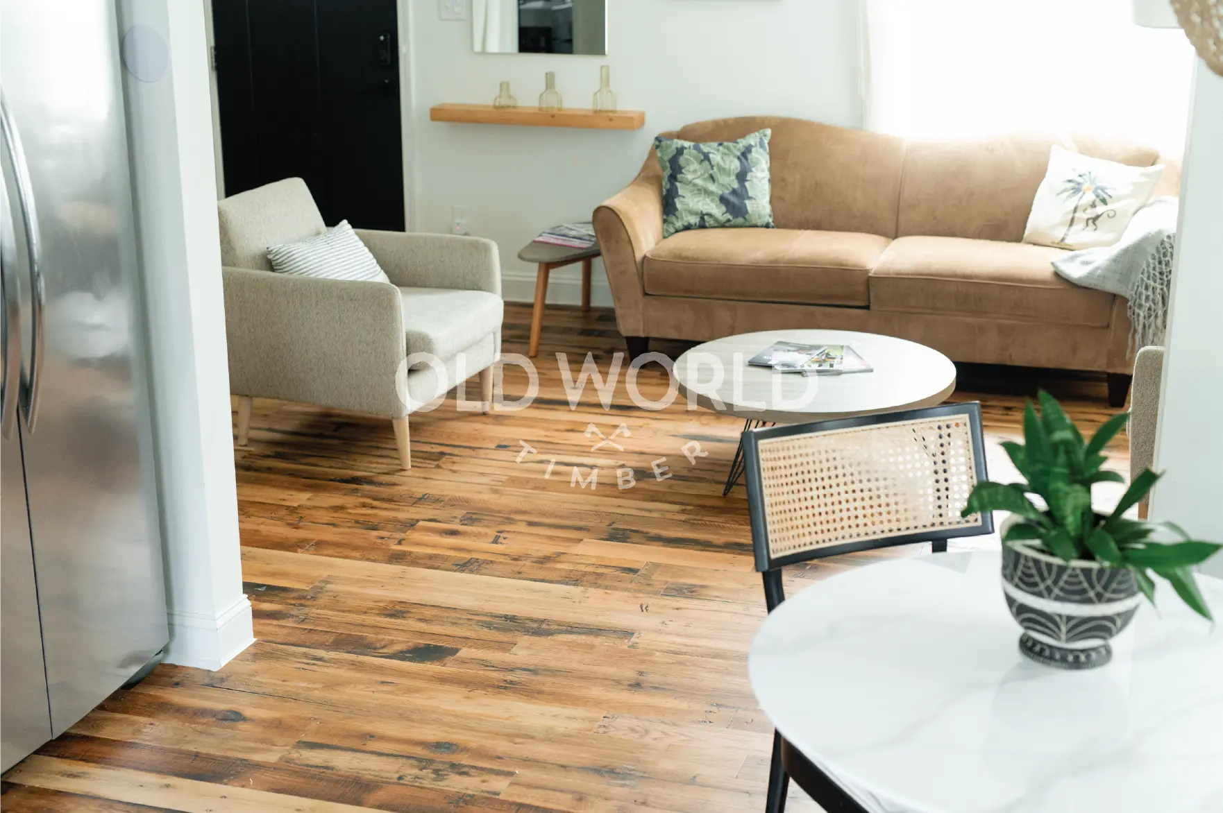 Industrial Oak engineered wood flooring in a modern living room with neutral decor and reclaimed textures visible on each plank.