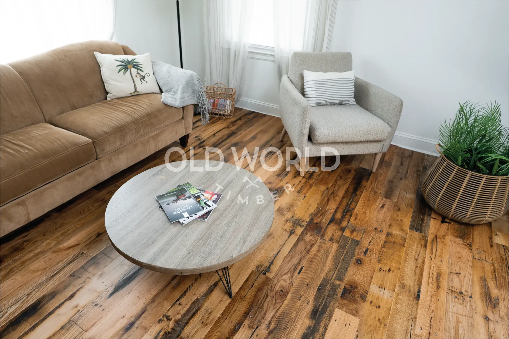 Industrial Oak engineered floors featuring nail holes and aged grain beneath clean, modern furniture in a well-lit space.