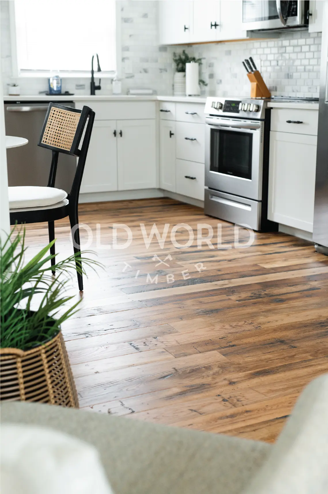 Antique oak floorboards repurposed into engineered flooring, sourced from old tire factories and restored for modern interiors.