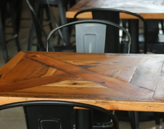 Reclaimed Bar and Table Tops & Whitewashed Wallboard Paneling