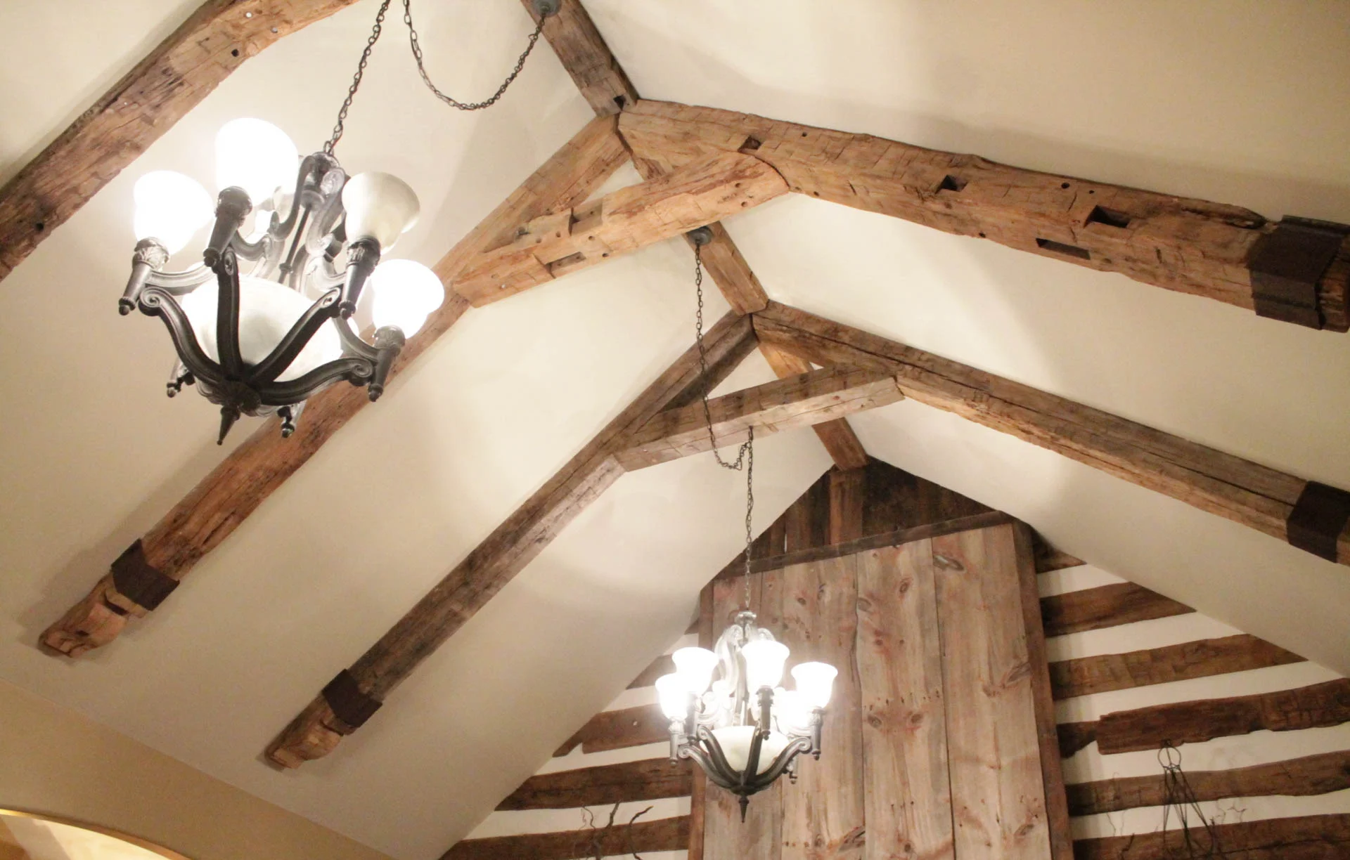 a white ceiling with rustic box beams