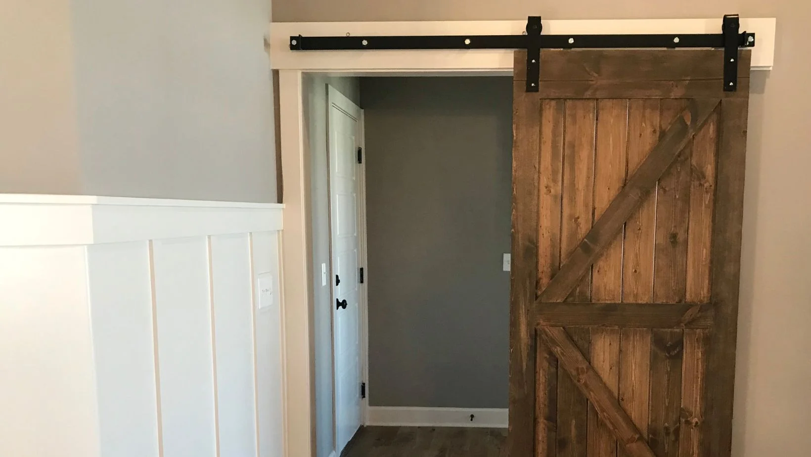 an opened z-pattern reused barn door
