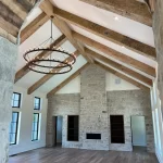 Living Room That Has Reclaimed Wood Beams
