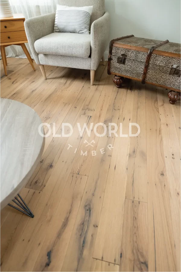 Engineered flooring made from reclaimed white oak, showing rich tones and tight grain from industrial warehouse wood.