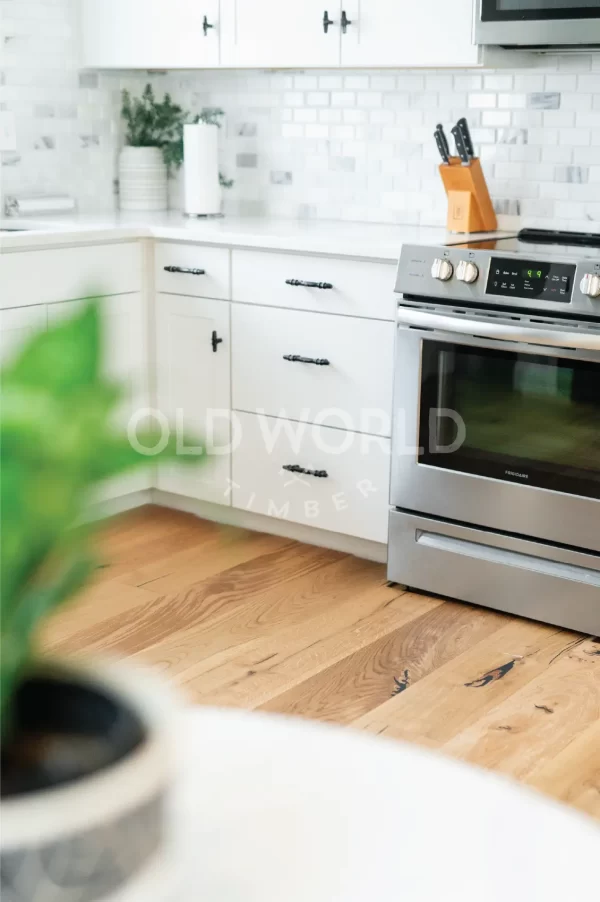 Frigidaire oven and kitchen corner with Modern Harvest engineered flooring showcasing sustainable oak wood with minimal rustic streaks.
