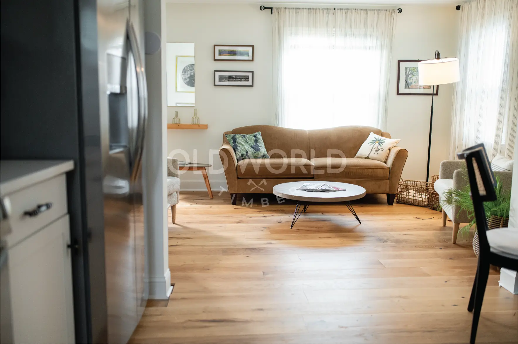Arched Entry View of Living Room with Modern Harvest Flooring