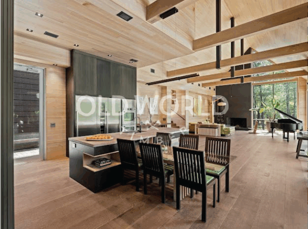 Modern kitchen interior featuring Oak Rift and Quartered engineered flooring and natural wood ceilings.
