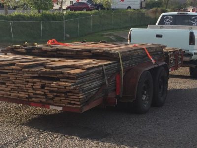 Reclaimed lumber planks that are ready for shipping