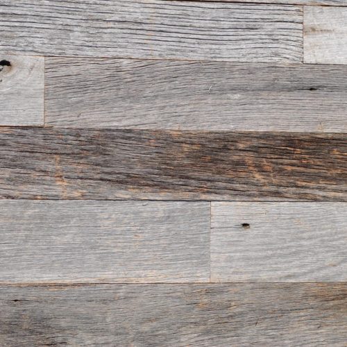 Reclaimed barnwood wheathered gray wallboard with straight edges